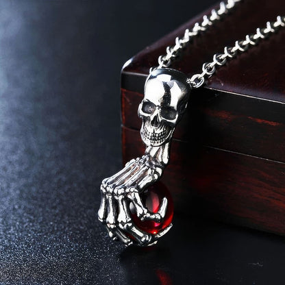 Collier Tête de Mort et Main de Squelette